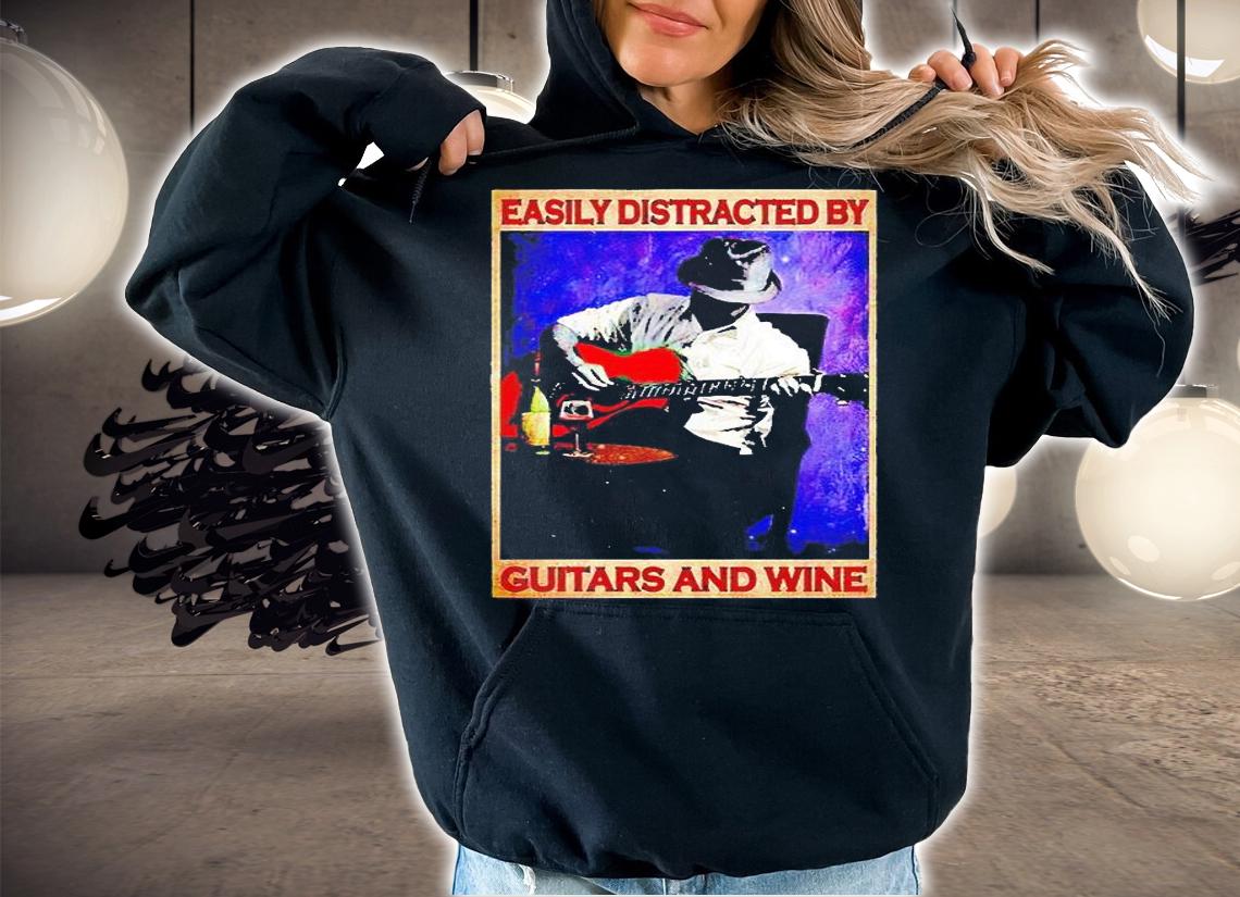 Easily distracted by guitar and wine T-shirt