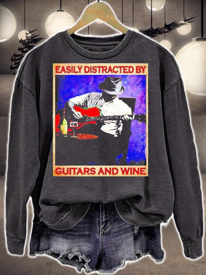 Easily distracted by guitar and wine T-shirt