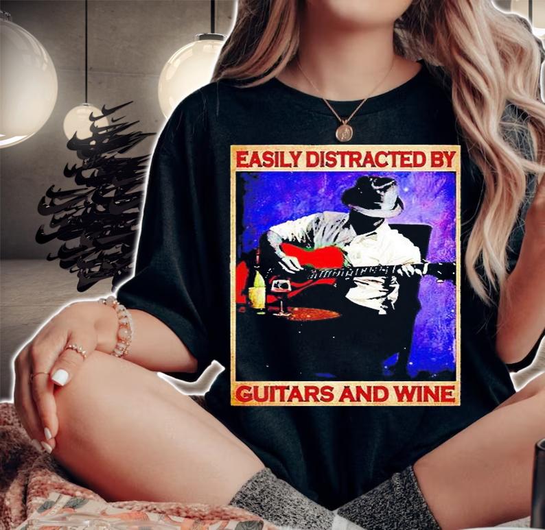 Easily distracted by guitar and wine T-shirt